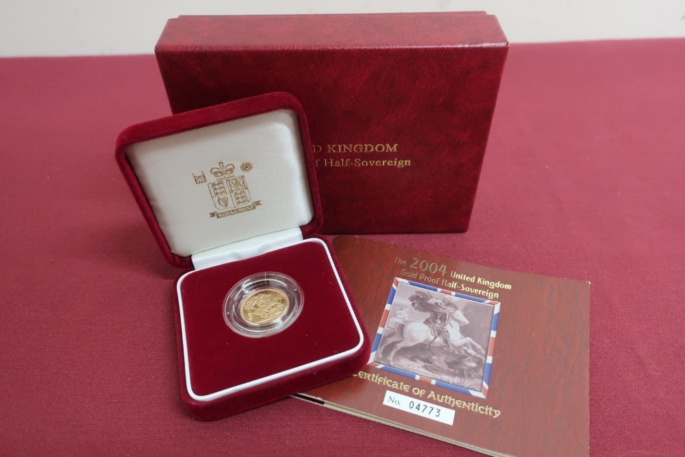 QEll UK Royal Mint gold proof half Sovereign 2004, in plastic case, display case and box with COA