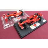 Hot Wheels 1:18 scale model Ferrari F2007 limited edition 1620/5555, and another, both on plinths