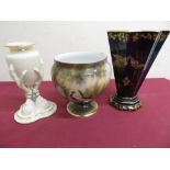 Royal Worcester vase modelled as an urn, supported by three talons on shaped base, printed mark (