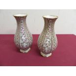 Pair of Dresden porcelain vases, decorated with garden flowers within gilt borders (H19cm) (2)
