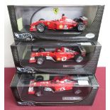 Hot Wheels 1:18 scale model Ferrari's Michael Schumacher collection F2001, F2002, F2003GA, all on