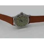 Girard Perregaux Sea Scout hand wound wrist watch. Stainless steel case on leather strap