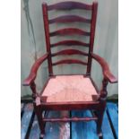 19th C rush seated ladder back arm chair