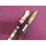 Late 19th C indian bone walking stick, inset with hardwood, ivory handle carved with dead bird L2cm,