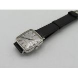 Omega Geneve hand wound wristwatch rectangular chromium plated case on leather strap, case back