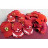 Ferrari motor racing memorabilia including baseball caps, pennants, keyrings, desk pen, etc (2