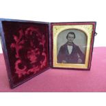 Victorian Ambrotype photo. study of a gentleman, in arched mount, and leather case