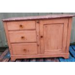 Victorian waxed pine marble top wash stand with single panel cupboard door flanked by three