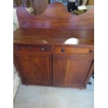 Victorian mahogany sideboard with raised shaped back above two drawers and two panelled doors W111cm