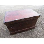 Victorian pitch pine blanket box, with metal bound hinged lid and side handles and plinth base