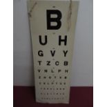 W Wiseman & Co Opticians tin sight board, black letters on a white ground, 61cm x 23cm