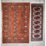 Small rust ground Bokhara type rug W64cm L98cm and similar beige ground runner W30cm L90cm (2)