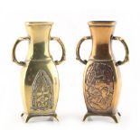 Two similar late 19th / early 20th century Japanese bronze vases, one with panels depicting a
