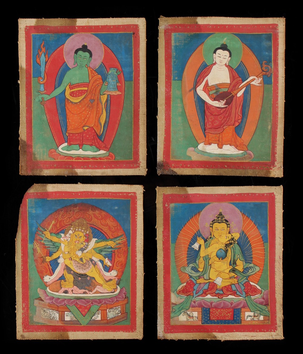 A set of four small 19th century Tibetan thankas of thangkas, each depicting a different deity, each