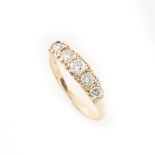 Property of a lady - a 9ct yellow gold diamond five stone ring, the five round brilliant cut