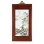 A Chinese famille rose porcelain rectangular plaque depicting figures in a mountainous landscape,