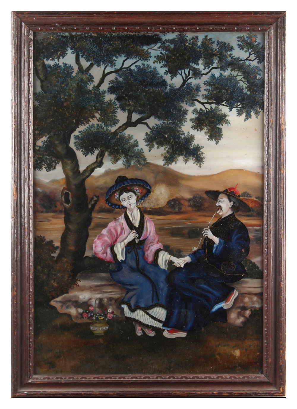 A 19th century Chinese reverse painting on glass depicting a seated gentleman & wife smoking