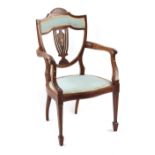 Property of a gentleman - an Edwardian mahogany & marquetry inlaid shield-back elbow chair with pale