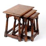 Property of a lady - a good quality reproduction oak nest of three occasional tables (3).