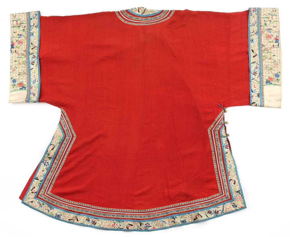 A late 19th century Chinese embroidered silk lady's robe, with red ground. - Image 2 of 2