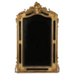 Property of a gentleman - a late 19th century gilt framed wall mirror, with rocaille cresting,