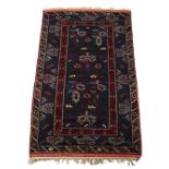 Property of a gentleman - an Anatolian woollen hand-made carpet with blue ground, 78 by 47ins. (
