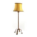 Property of a gentleman - a gilt painted wrought iron lamp standard with shade.