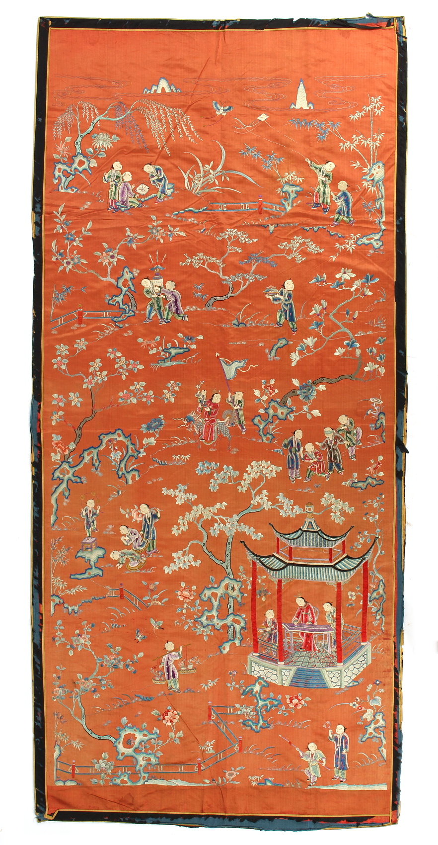 A 19th century Chinese embroidered silk panel depicting twenty-five boys & other figures in