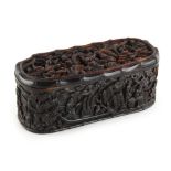 A 19th century Chinese carved tortoiseshell rectangular box with rounded ends, carved in deep relief