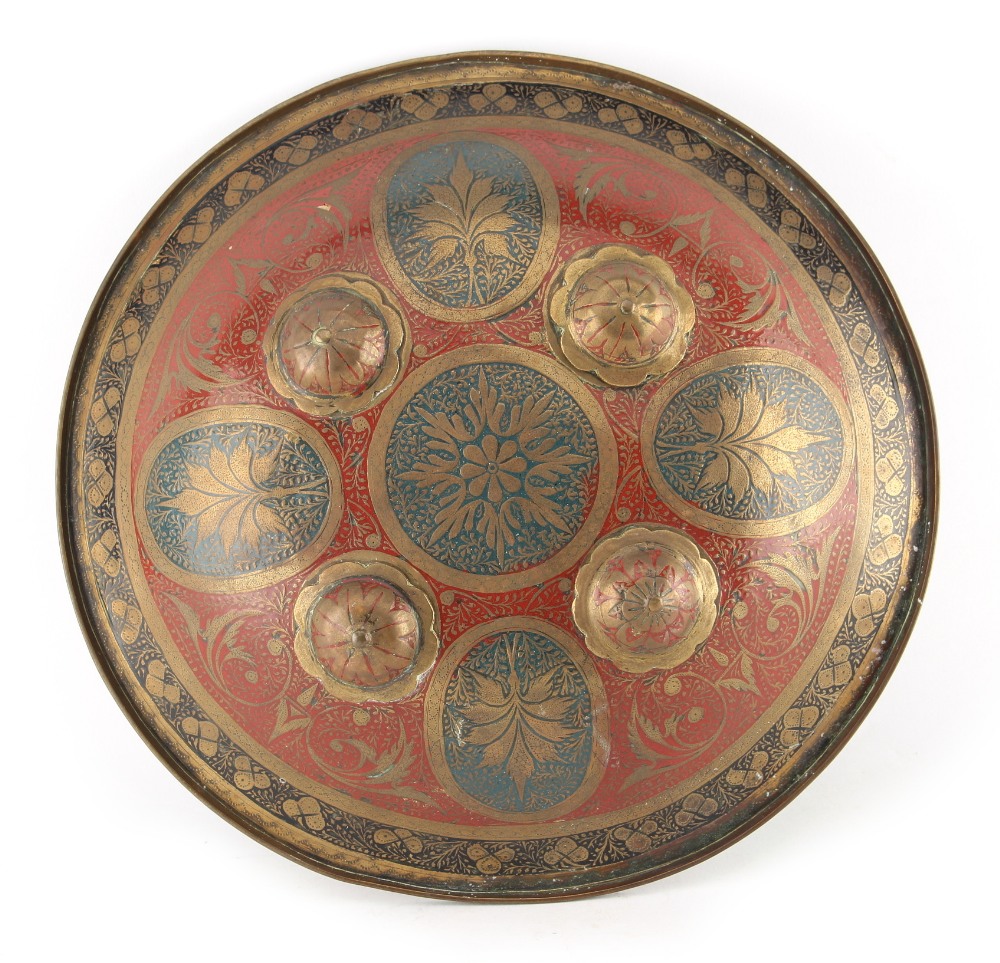 Property of a gentleman - a late 19th century Indian brass small shield, dhal, with four