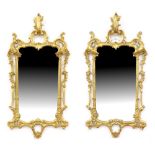 Property of a lady - a pair of early 20th century Italian Florentine carved giltwood wall mirrors,