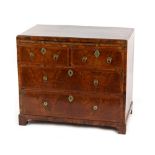 Property of a gentleman - a small early 18th century George I walnut & featherbanded chest of two