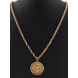Property of a lady - a 9ct yellow gold Aries pendant set with a single diamond, approximately 12.9