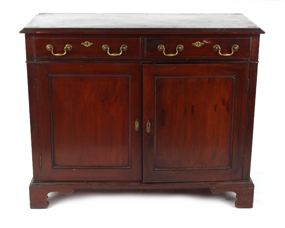 Property of a gentleman - a Georgian mahogany cupboard with two drawers above two doors, 45ins. (