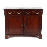Property of a gentleman - a Georgian mahogany cupboard with two drawers above two doors, 45ins. (