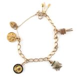 Property of a lady - a 9ct yellow gold charm bracelet, one charm with bust of Queen Victoria in