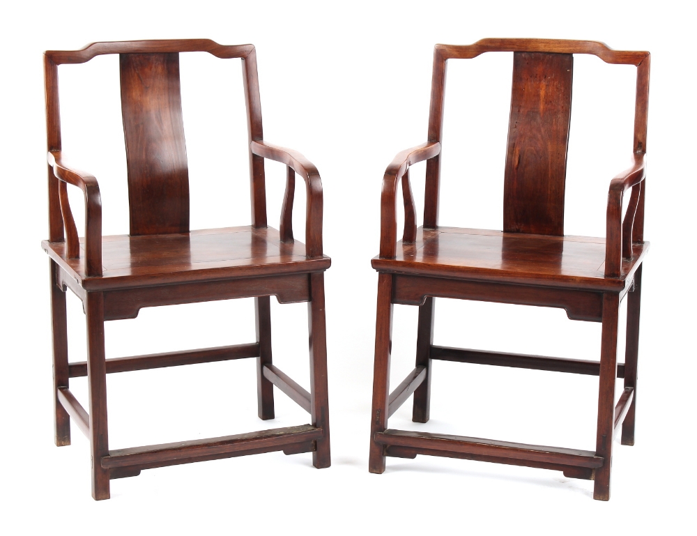 A pair of 19th century Chinese hongmu throne chairs, parts possibly huanghuali (2). Provenance -