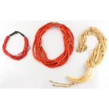 Property of a lady - a Middle Eastern or tribal seven strand red cylindrical bead necklace; together