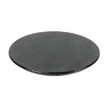 Property of a gentleman - an ebonised lazy Susan, 30.25ins. (77cms.) diameter.