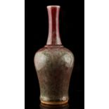A Chinese peach bloom baluster vase, 20th century, 9ins. (23cms.) high.