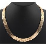 Property of a lady - a modern 9ct yellow gold link necklace, 16.5ins. (42cms.) long, approximately