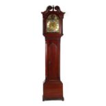 Property of a lady - a mahogany longcase clock with blind fretwork decorations, the brass dial