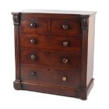 Property of a lady - an early Victorian mahogany chest of drawers with stylised leaf scroll capped