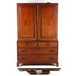 Property of a deceased estate - a George III mahogany two part linen press, the upper section