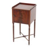 Property of a gentleman - an early 19th century George IV mahogany pot cupboard with turned bobbin