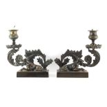 Property of a deceased estate - a pair of 19th century patinated bronze candlesticks, each of