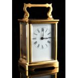 An early 20th century French brass cased carriage clock timepiece, 4.5ins. (11.4cms.) high (with