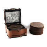 Property of a lady - a late 19th century walnut cased 8-inch polyphon; together with fifty-two discs