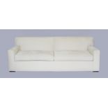 Property of a lady - a modern cream upholstered sofa, 90ins. (229cms.) long.
