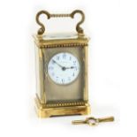 Property of a lady - a late 19th century French brass cased carriage clock timepiece, the enamel